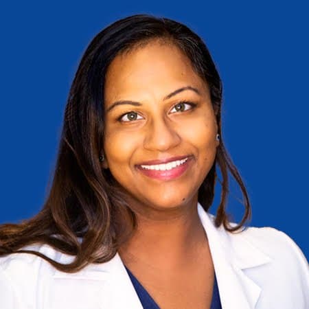 M. Varghese, MD