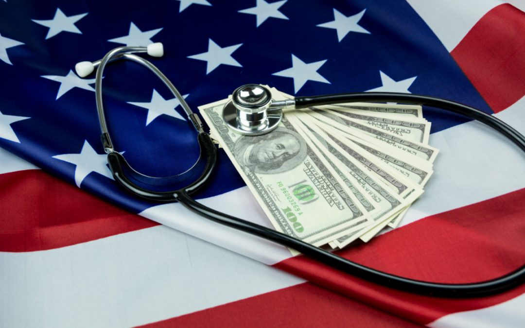 US flag with dollars and stethoscope